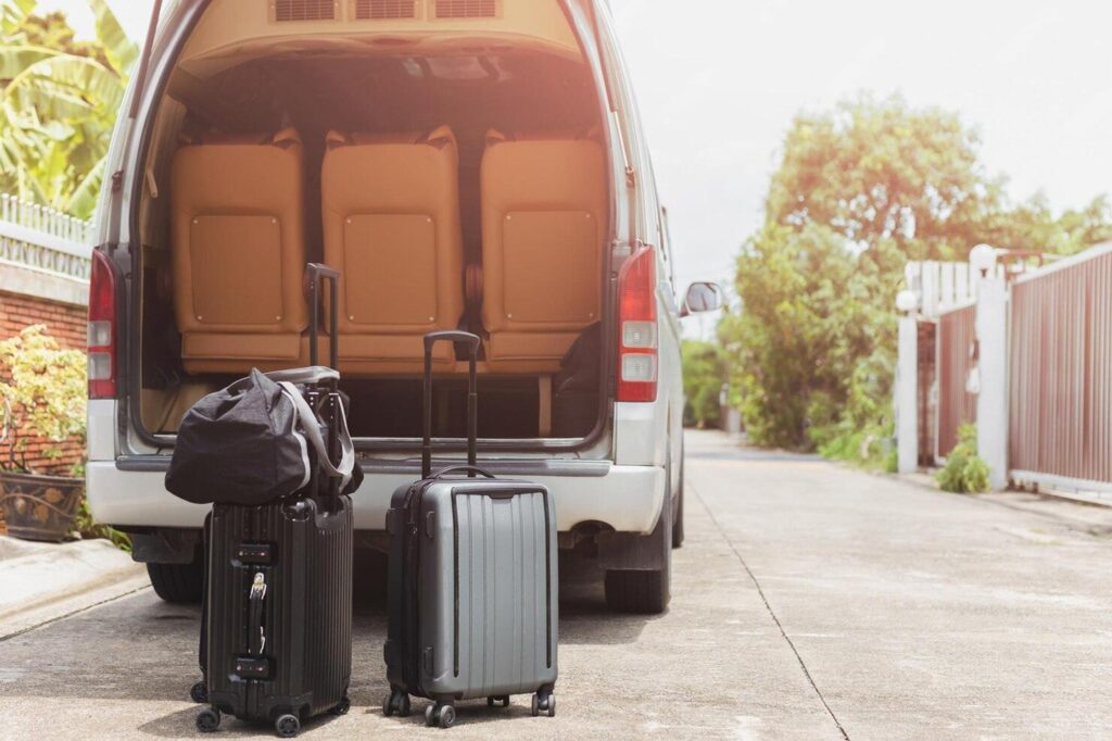 road-trip-with-traveling-van-suitcase-travel-concept_1048944-11742736